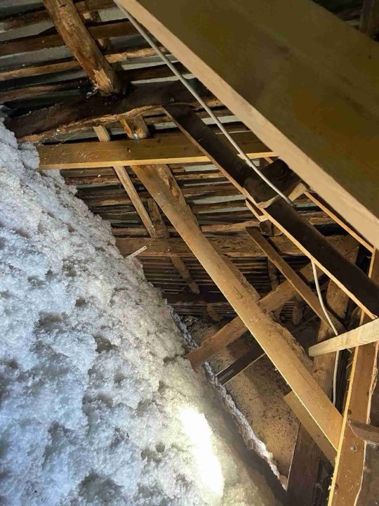 Combles isolés et charpente en bois